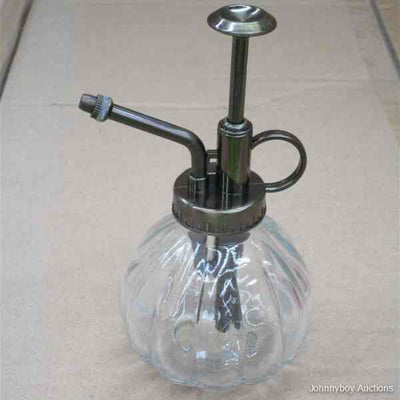 Clear Glass Bottle and Sprinkler Head