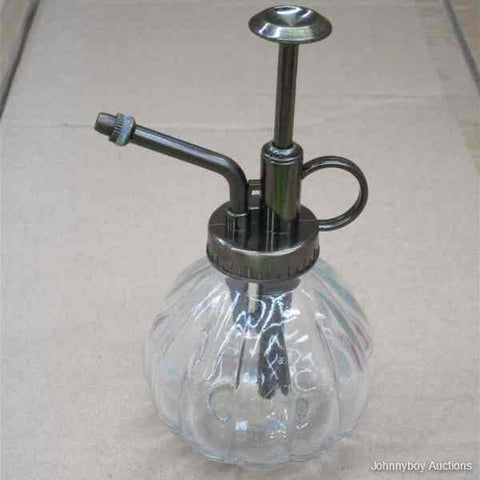 Clear Glass Bottle and Sprinkler Head